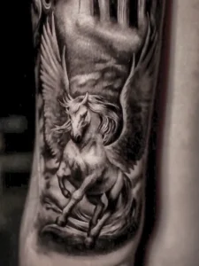 Realistic paganus tattoo by Colombian tattoo artist Clayton Goethe